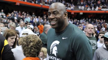 Mar 27, 2015; Syracuse, NY, USA; Michigan State Spartans former player Magic Johnson during the second half against the Oklahoma Sooners in the semifinals of the east regional of the 2015 NCAA Tournament at Carrier Dome. Mandatory Credit: Mark Konezny-USA TODAY Sports