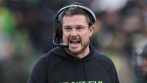 Oregon Ducks dan lanning schedule Dante moore Tradarian Ball LaMarcus Bell Dierre Hill Jr. Recruiting Big Ten Utah Utes NIL 