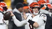 Jan 4, 2025; Pittsburgh, Pennsylvania, USA;  Cincinnati Bengals quarterback Joe Burrow (9) warms up before the game against the Pittsburgh Steelers at Acrisure Stadium. Mandatory Credit: Charles LeClaire-Imagn Images