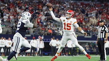 Nov 27, 2025; Arlington, Texas, USA; Kansas City Chiefs quarterback Patrick Mahomes (15) throws a pass for a touchdown against Dallas Cowboys defensive tackle Quinnen Williams (92) during the fourth quarter at AT&T Stadium. Mandatory Credit: Kevin Jairaj-Imagn Images