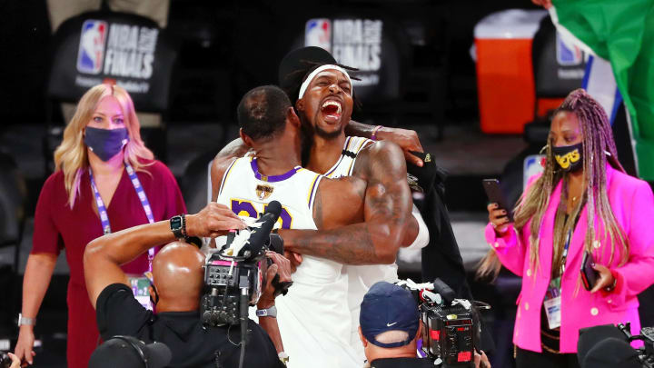 Oct 11, 2020; Lake Buena Vista, Florida, USA; Los Angeles Lakers forward LeBron James (23) and center Dwight Howard (39) celebrate their win after game six of the 2020 NBA Finals at AdventHealth Arena. The Los Angeles Lakers won 106-93 to win the series. Mandatory Credit: Kim Klement-USA TODAY Sports