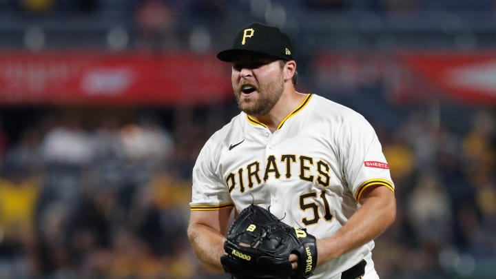 Jul 22, 2024; Pittsburgh, Pennsylvania, USA;  Pittsburgh Pirates relief pitcher David Bednar (51) reacts after pitching against the St. Louis Cardinals in the ninth inning at PNC Park. Pittsburgh won 2-1. Mandatory Credit: Charles LeClaire-USA TODAY Sports