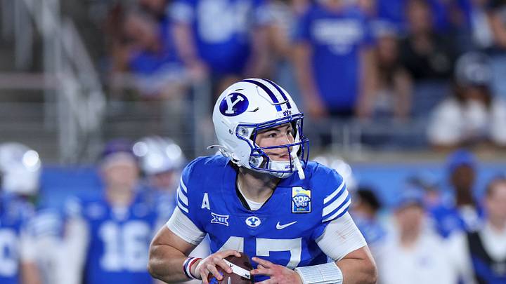Dec 27, 2025; Orlando, FL, USA; BYU Cougars quarterback Bear Bachmeier (47) looks to pass against the Georgia Tech Yellow Jackets in the fourth quarter during the Pop-Tarts Bowl at Camping World Stadium. Mandatory Credit: Nathan Ray Seebeck-Imagn Images