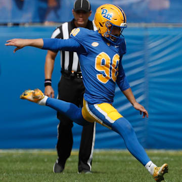 Sep 24, 2022; Pittsburgh, Pennsylvania, USA;  Pittsburgh Panthers place kicker Ben Sauls (90) kicks off to the Rhode Island Rams during the first quarter at Acrisure Stadium. Mandatory Credit: Charles LeClaire-Imagn Images