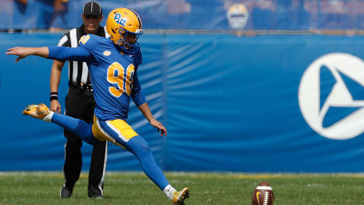 Sep 24, 2022; Pittsburgh, Pennsylvania, USA;  Pittsburgh Panthers place kicker Ben Sauls (90) kicks off to the Rhode Island Rams during the first quarter at Acrisure Stadium. Mandatory Credit: Charles LeClaire-Imagn Images