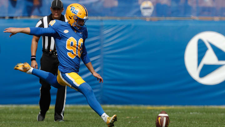 Sep 24, 2022; Pittsburgh, Pennsylvania, USA;  Pittsburgh Panthers place kicker Ben Sauls (90) kicks off to the Rhode Island Rams during the first quarter at Acrisure Stadium. Mandatory Credit: Charles LeClaire-Imagn Images