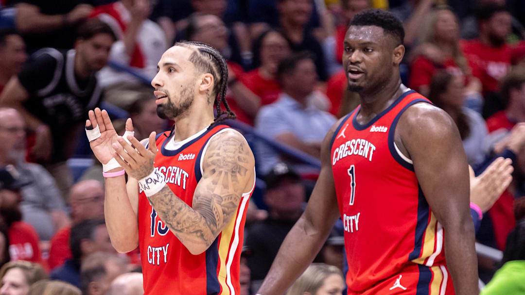 Apr 16, 2024; New Orleans, Louisiana, USA; New Orleans Pelicans guard Jose Alvarado (15) and forward Zion Williamson (1) react against the Los Angeles Lakers on a time out during the first half of a play-in game of the 2024 NBA playoffs against the New Orleans Pelicans at Smoothie King Center. Mandatory Credit: Stephen Lew-Imagn Images
