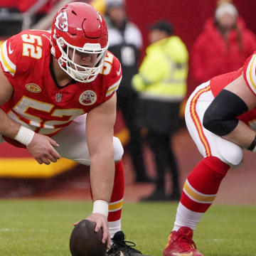 Dec 25, 2023; Kansas City, Missouri, USA; Kansas City Chiefs center Creed Humphrey (52) and guard Joe Thuney (62) at the line of scrimmage against the Las Vegas Raiders during the game at GEHA Field at Arrowhead Stadium. Mandatory Credit: Denny Medley-USA TODAY Sports