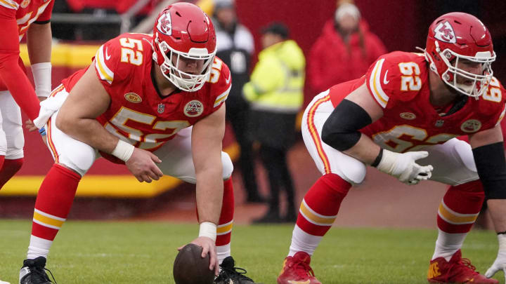 Dec 25, 2023; Kansas City, Missouri, USA; Kansas City Chiefs center Creed Humphrey (52) and guard Joe Thuney (62) at the line of scrimmage against the Las Vegas Raiders during the game at GEHA Field at Arrowhead Stadium. Mandatory Credit: Denny Medley-USA TODAY Sports