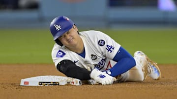 Oct 26, 2024; Los Angeles, California, USA; Los Angeles Dodgers designated hitter Shohei Ohtani (17) reacts at second base after an apparent injury in the seventh inning against the New York Yankees during game two of the 2024 MLB World Series at Dodger Stadium. Mandatory Credit: Jayne Kamin-Oncea-Imagn Images