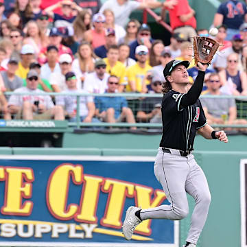 Aug 25, 2024; Boston, Massachusetts, USA; Arizona Diamondbacks center fielder Jake McCarthy (31) makes a catch for an out against the Boston Red Sox during the third inning at Fenway Park. Mandatory Credit: Eric Canha-USA TODAY Sports