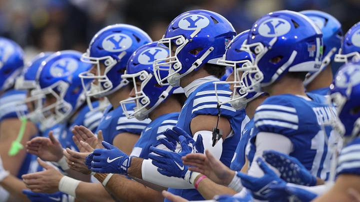 Nov 29, 2025; Provo, Utah, USA; The BYU Cougars warm up before the game against the UCF Knights at LaVell Edwards Stadium. Mandatory Credit: Rob Gray-Imagn Images