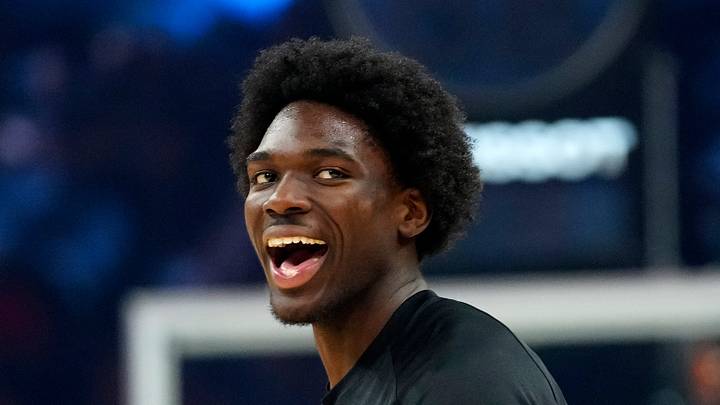 Suns forward Rasheer Fleming (20) laughs with his teammates prior to a game against the Bucks at the Mortgage Matchup Center in Phoenix on March 21, 2026.