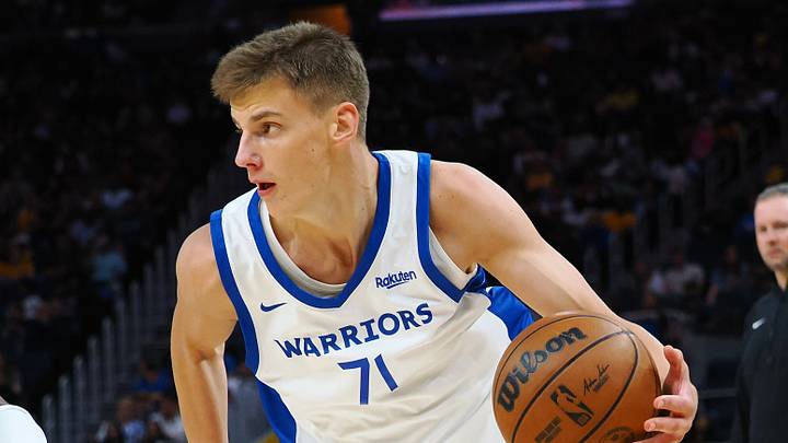 Jul 7, 2024; San Francisco, CA, USA; Golden State Warriors forward/guard Mantas Rubstavicius (71) drives in against the Los Angeles Lakers during the third quarter at Chase Center. Mandatory Credit: Kelley L Cox-USA TODAY Sports