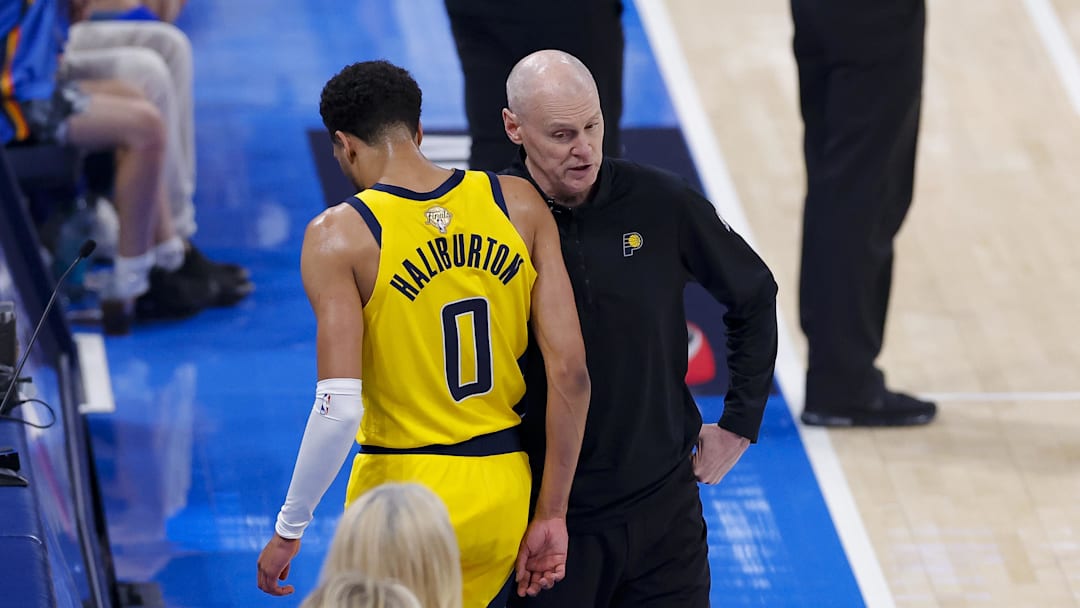 Jun 16, 2025; Oklahoma City, Oklahoma, USA; Indiana Pacers guard Tyrese Haliburton (0) comes off the floor past head coach Rick Carlisle in the first quarter against the Oklahoma City Thunder during game five of the 2025 NBA Finals at Paycom Center. Mandatory Credit: Alonzo Adams-Imagn Images Jun 16, 2025; Oklahoma City, Oklahoma, USA; Indiana Pacers guard Tyrese Haliburton (0) comes off the floor past head coach Rick Carlisle in the first quarter against the Oklahoma City Thunder during game five of the 2025 NBA Finals at Paycom Center. Mandatory Credit: Alonzo Adams-Imagn Images