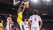 Oct 25, 2025; New York, NY, USA;  Michigan Wolverines forward Morez Johnson Jr. (21) dunks in the first half against the St. John's Red Storm at Madison Square Garden. Mandatory Credit: Wendell Cruz-Imagn Images