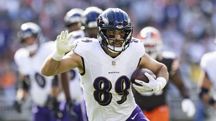 Oct 27, 2024; Cleveland, Ohio, USA; Baltimore Ravens tight end Mark Andrews (89) runs the ball against the Cleveland Browns during the first quarter at Huntington Bank Field. Mandatory Credit: Scott Galvin-Imagn Images