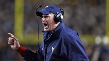 Nov 16, 2006; Pittsburgh , PA, USA; West Virginia coach Rich Rodriguez argues a penalty that took away Steve Slatons (not pictured) touchdown against Pittsburgh at Heinz Field in Pittsburgh, PA. Mandatory Credit: Jason Bridge-Imagn Images Copyright (c) 2006 Jason Bridge