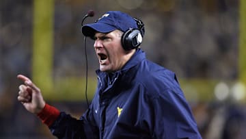 Nov 16, 2006; Pittsburgh , PA, USA; West Virginia coach Rich Rodriguez argues a penalty that took away Steve Slaton's (not pictured) touchdown against Pittsburgh at Heinz Field in Pittsburgh, PA. Mandatory Credit: Jason Bridge-Imagn Images Copyright (c) 2006 Jason Bridge
