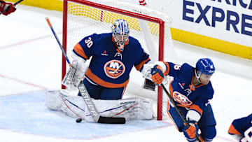 Nov 9, 2024; Elmont, New York, USA; New York Islanders goaltender Ilya Sorokin (30) makes a save against the New Jersey Devils during the first period at UBS Arena. Mandatory Credit: John Jones-Imagn Images