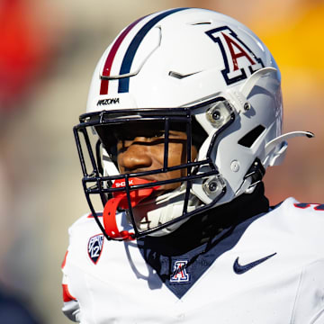 Nov 25, 2023; Tempe, Arizona, USA; Arizona Wildcats running back Rayshon Luke (21) against the Arizona State Sun Devils during the Territorial Cup at Mountain America Stadium
