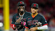 Sep 22, 2023; Cincinnati, Ohio, USA; Cincinnati Reds shortstop Elly De La Cruz (44) and third baseman Noelvi Marte (16) during the fifth inning against the Pittsburgh Pirates at Great American Ball Park. Mandatory Credit: Katie Stratman-Imagn Images