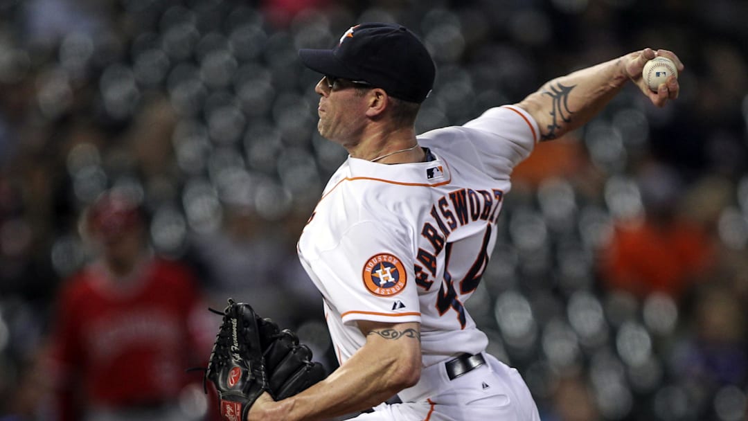 Jun 4, 2014; Houston, TX, USA; Houston Astros relief pitcher Kyle Farnsworth (44) pitches during the eighth inning against the Los Angeles Angels at Minute Maid Park. Mandatory Credit: Troy Taormina-Imagn Images Jun 4, 2014; Houston, TX, USA; Houston Astros relief pitcher Kyle Farnsworth (44) pitches during the eighth inning against the Los Angeles Angels at Minute Maid Park. Mandatory Credit: Troy Taormina-Imagn Images