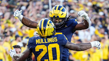 running back Kalel Mullings (20) celebrates a touchdown against USC with running back Donovan Edwards (7) during the second half at Michigan Stadium in Ann Arbor on Saturday, Sept. 21, 2024.
