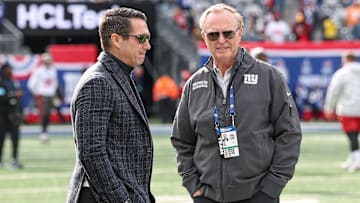 Nov 24, 2024; East Rutherford, New Jersey, USA; New York Giants owner John Mara, left, and New York Giants general manager Joe Schoen on the field before the game between the Giants and the Tampa Bay Buccaneers at MetLife Stadium. Mandatory Credit: Vincent Carchietta-Imagn Images
