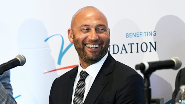 USC Trojans Michigan Wolverines Willie McGinest LenDale White Derek Jeter Marcus Allen Los Angeles Memorial Coliseum Big Ten