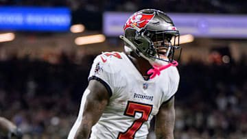 Oct 13, 2024; New Orleans, Louisiana, USA; Tampa Bay Buccaneers running back Bucky Irving (7) celebrates during the fourth quarter against the New Orleans Saints at Caesars Superdome. Mandatory Credit: Matthew Hinton-Imagn Images