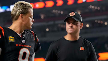 Cincinnati Bengals quarterback Joe Burrow (9) and head coach Zac Taylor head for the locker room after the fourth quarter of the NFL Week 3 game between the Cincinnati Bengals and the Washington Commanders at Paycor Stadium in downtown Cincinnati on Monday, Sept. 23, 2024. The Bengals remain winless after a 38-33 loss to Washington.