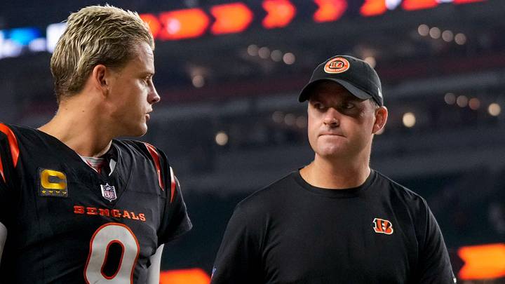 Cincinnati Bengals quarterback Joe Burrow (9) and head coach Zac Taylor head for the locker room after the fourth quarter of the NFL Week 3 game between the Cincinnati Bengals and the Washington Commanders at Paycor Stadium in downtown Cincinnati on Monday, Sept. 23, 2024. The Bengals remain winless after a 38-33 loss to Washington.