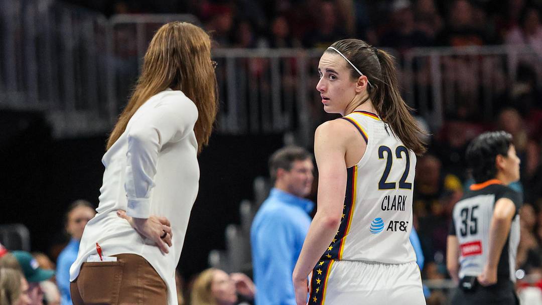 Jun 20, 2026; Atlanta, Georgia, USA; Indiana Fever guard Caitlin Clark (22) looks back at Indiana Fever head coach Stephanie White during the game against the Atlanta Dream during the second quarter at State Farm Arena. Mandatory Credit: Jordan Godfree-Imagn Images