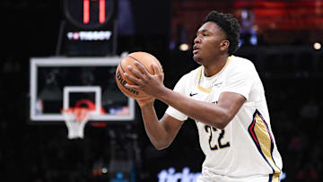 Dec 6, 2025; Brooklyn, New York, USA; New Orleans Pelicans center Derik Queen (22) shoots the ball against the Brooklyn Nets during the first half at Barclays Center. Mandatory Credit: Vincent Carchietta-Imagn Images