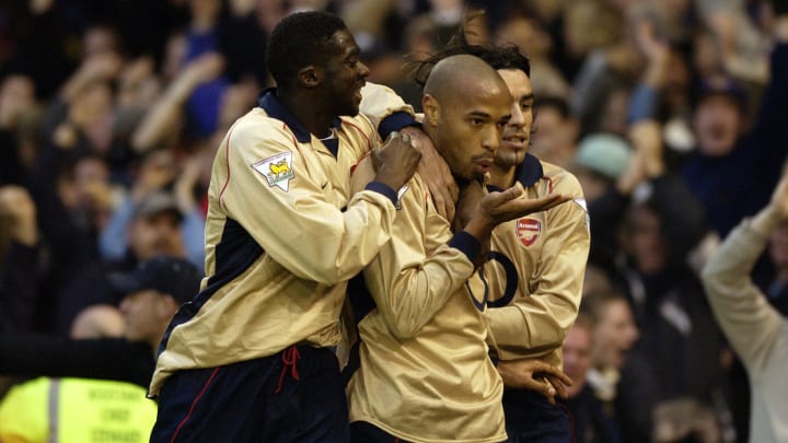 Thierry Henry of Arsenal celebrates scoring the winning goal 