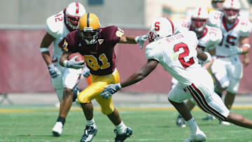 Shaun McDonald gets around the tackle