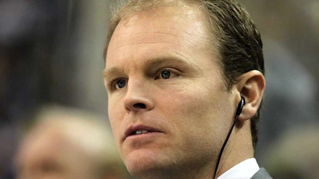 Dec 26, 2011; Buffalo, NY, USA;  Buffalo Sabres assistant coach Kevyn Adams watches during a game against the Washington Capitals at the First Niagara Center.  Mandatory Credit: Timothy T. Ludwig-Imagn Images