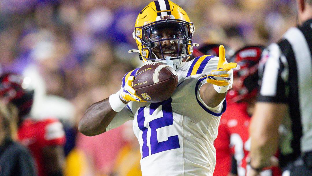 LSU Tigers wide receiver Kyle Parker (12) reacts to making a first down against Western Kentucky Hilltoppers defensive back Nazir Ward (not pictured) during the first half at Tiger Stadium. 