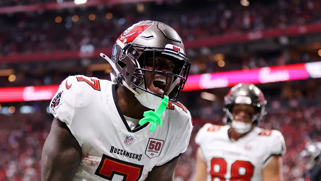 Tampa Bay Buccaneers running back Bucky Irving (7) celebrates after scoring a touchdown against the Atlanta Falcons 