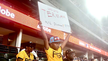 Grant Ashley, cousin of Termarr Johnson, holds up a sign of support at the MLB Futures All-Star Game in Texas in 2024.