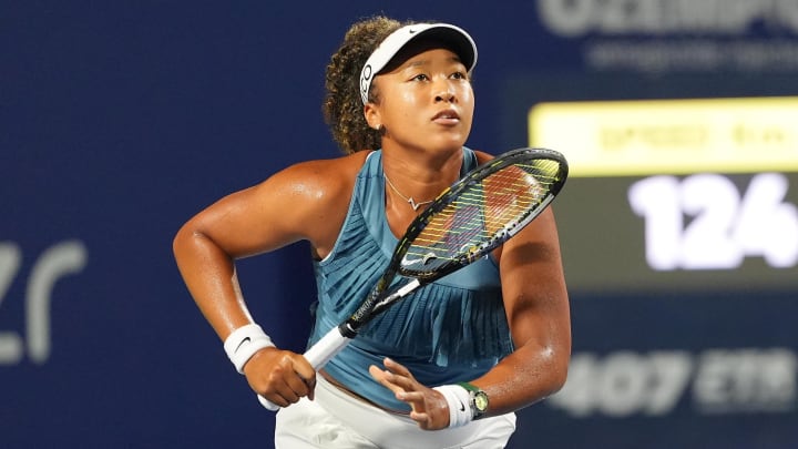 Aug 8, 2024; Toronto, Ontario, Canada; Naomi Osaka (JPN) runs towards the net to get to a ball hit by Elise Mertens (not pictured) during the second round of play at Sobeys Stadium. Mandatory Credit: John E. Sokolowski-USA TODAY Sports