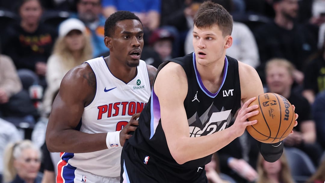 Mar 3, 2025; Salt Lake City, Utah, USA; Utah Jazz center Walker Kessler (24) posts up against Detroit Pistons center Jalen Duren (0) during the first half at Delta Center.