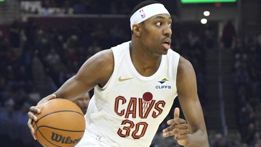 Apr 13, 2025; Cleveland, Ohio, USA; Cleveland Cavaliers forward Nae'Qwan Tomlin (30) dribbles in the first quarter against the Indiana Pacers at Rocket Arena. Mandatory Credit: David Richard-Imagn Images