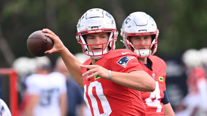 Aug 03, 2024; Foxborough, MA, USA; New England Patriots quarterback Drake Maye (10) throws a pass during training camp at Gillette Stadium. Mandatory Credit: Eric Canha-USA TODAY Sports