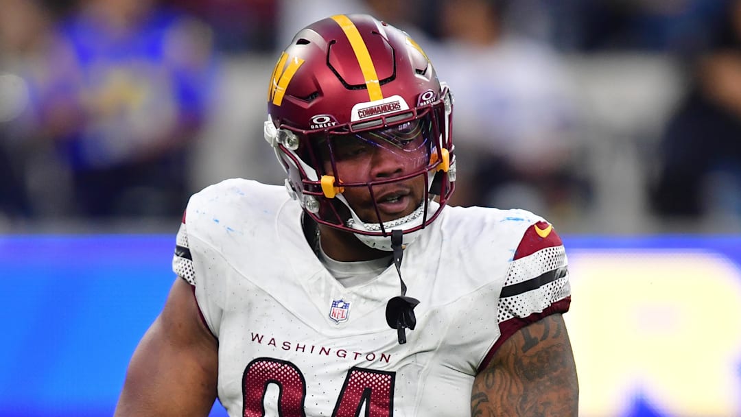 Dec 17, 2023; Inglewood, California, USA; Washington Commanders defensive tackle Daron Payne (94) reacts after sacking Los Angeles Rams quarterback Matthew Stafford (9) during the second half at SoFi Stadium. Mandatory Credit: Gary A. Vasquez-Imagn Images