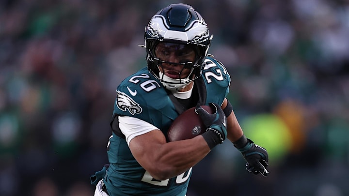 Philadelphia Eagles running back Saquon Barkley rushes with the ball. Philadelphia Eagles running back Saquon Barkley rushes with the ball.