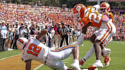 Sep 20, 2025; Clemson, South Carolina, USA; Syracuse Orange wide receiver Justus Ross-Simmons (12) catches a touchdown near Clemson Tigers cornerback Ashton Hampton (23) during the first quarter at Memorial Stadium. Mandatory Credit: Ken Ruinard/GREENVILLE NEWS-USA TODAY Network via Imagn Images