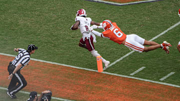 Troy Trojans receiver Tray Taylor (8) scores a touchdown near Clemson cornerback Ricardo Jones (6) during the first quarter at Memorial Stadium in Clemson, S.C. Saturday, September 6, 2025.