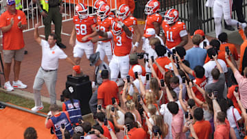 Clemson head coach Dabo Swinney rubs Howard’s Rock near the team before the game with Clemson and Troy at Memorial Stadium in Clemson, S.C. Saturday, September 6, 2025.